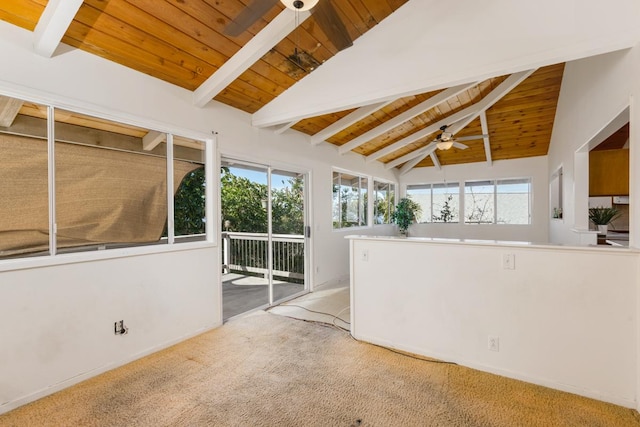 interior space featuring vaulted ceiling with beams, wood ceiling, and ceiling fan