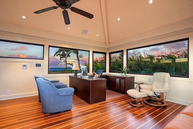 interior space with ceiling fan, wood-type flooring, and lofted ceiling with beams