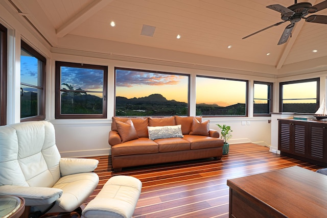 living room featuring wooden ceiling, ceiling fan, hardwood / wood-style floors, and lofted ceiling with beams