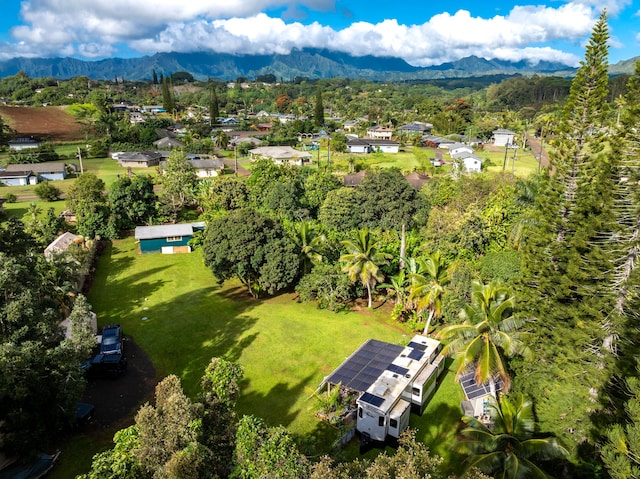 birds eye view of property featuring a mountain view