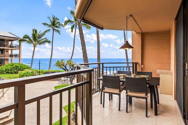 balcony featuring a water view