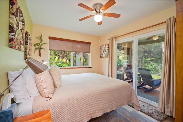 bedroom featuring ceiling fan and access to outside