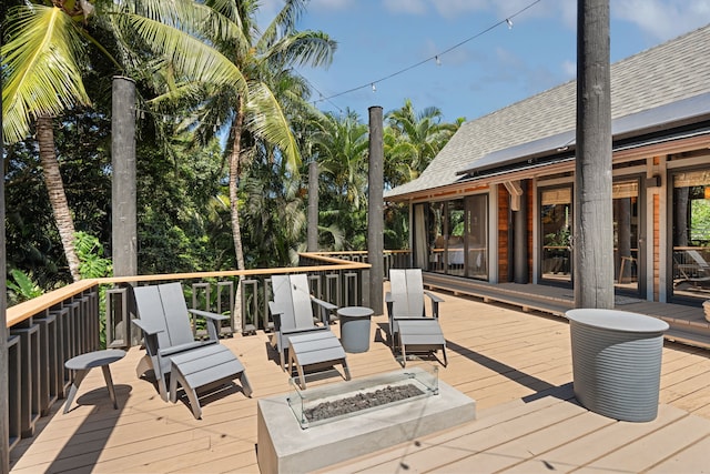 deck featuring a fire pit