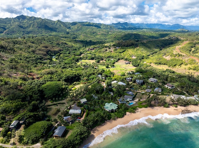 birds eye view of property featuring a water and mountain view