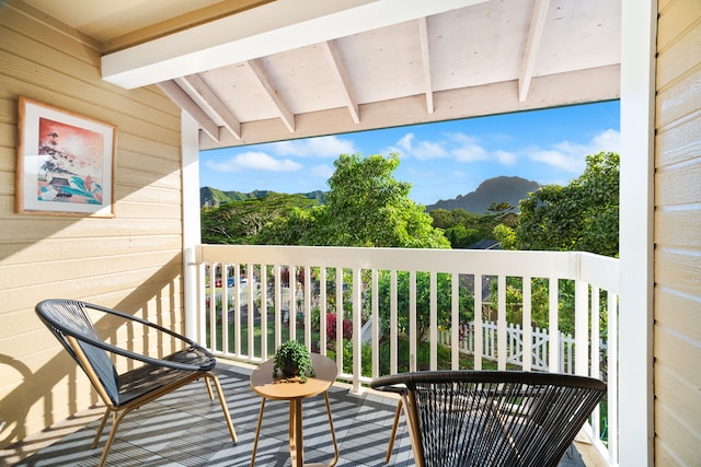 balcony featuring a mountain view