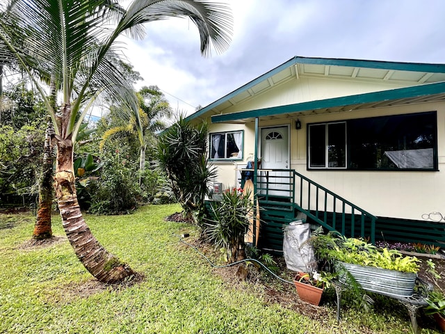 exterior space featuring a front lawn