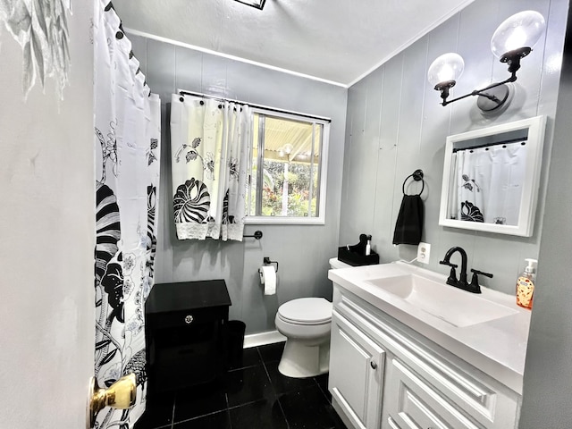 bathroom featuring vanity, ornamental molding, a shower with curtain, tile patterned floors, and toilet