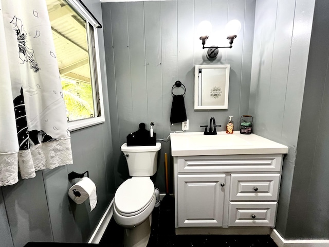 bathroom with vanity and toilet