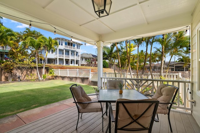 wooden deck with a yard