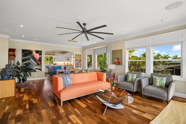 living room featuring ornamental molding, ceiling fan, and dark hardwood / wood-style flooring