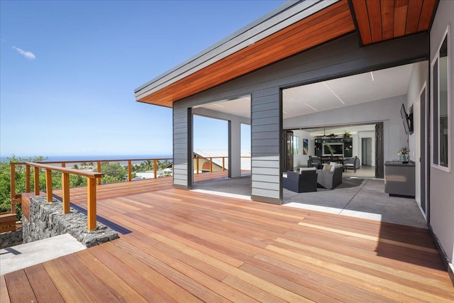 wooden deck featuring an outdoor living space