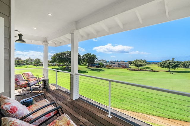 wooden deck with a yard