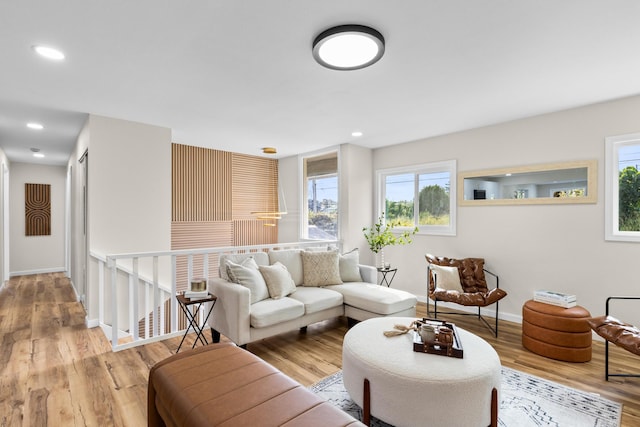 living room with light hardwood / wood-style floors