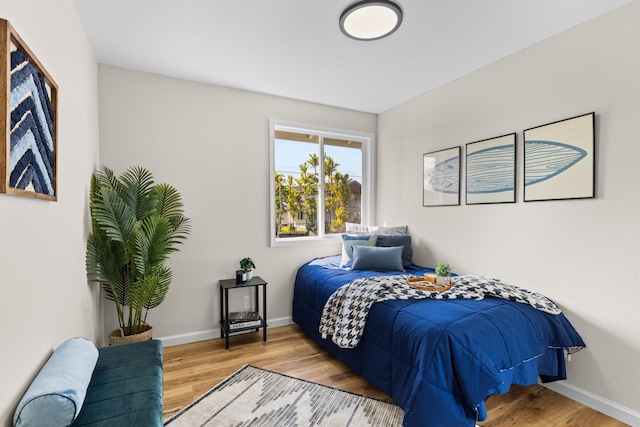 bedroom featuring hardwood / wood-style flooring