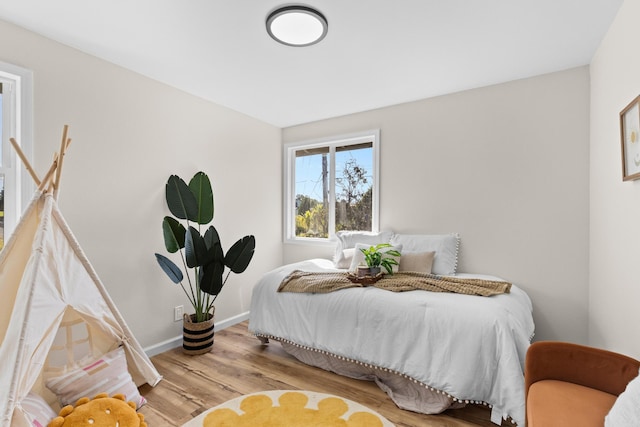 bedroom featuring light hardwood / wood-style flooring