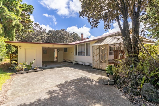 view of front of house with a carport