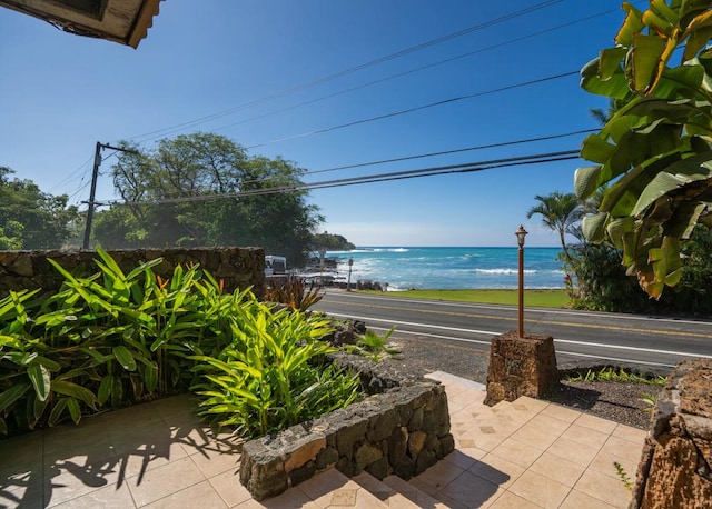 view of patio / terrace featuring a water view