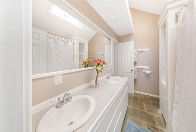 bathroom with vanity and a shower with shower curtain