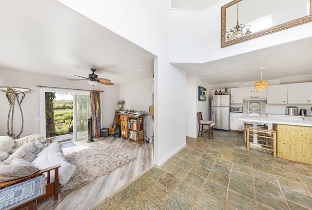 living room with ceiling fan