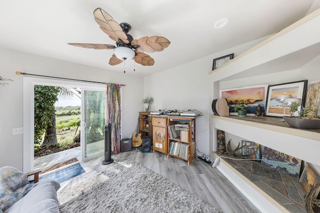 interior space featuring light hardwood / wood-style flooring and ceiling fan