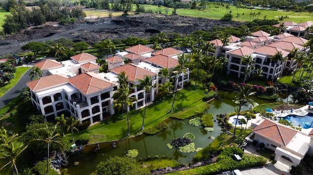 drone / aerial view with a water view