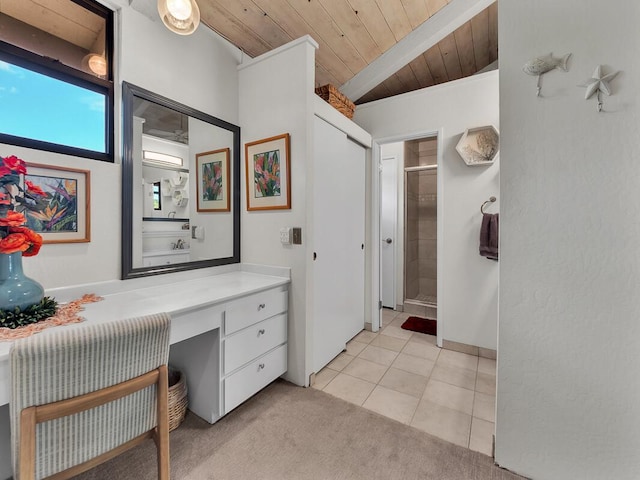 bathroom featuring tile patterned floors, an enclosed shower, wooden ceiling, vanity, and beam ceiling