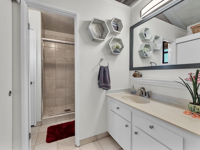 bathroom with tile patterned flooring, vanity, and a shower with shower door