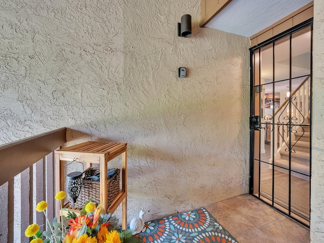 doorway to property featuring a balcony