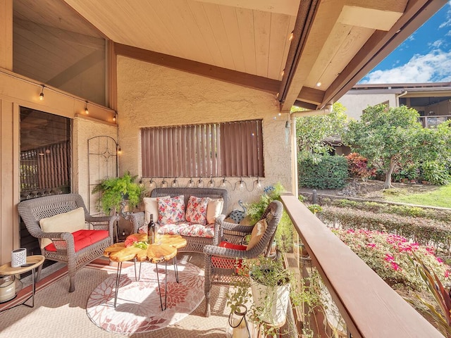 view of patio / terrace featuring a balcony and an outdoor living space