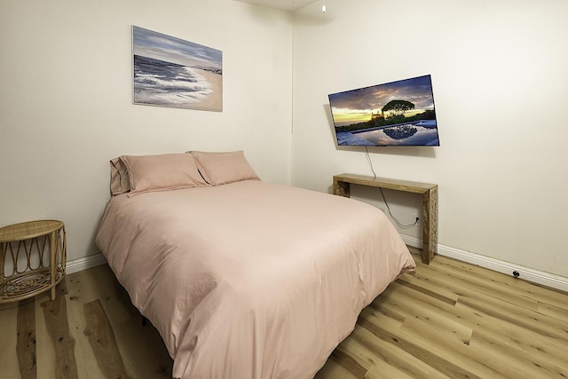 bedroom featuring light hardwood / wood-style flooring