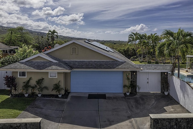 single story home with a garage