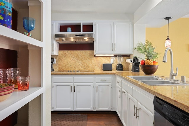 kitchen featuring hanging light fixtures, under cabinet range hood, white cabinetry, and stainless steel dishwasher