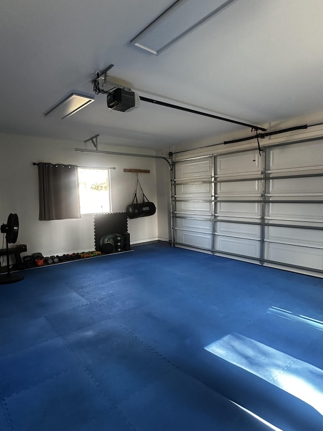 garage featuring a garage door opener