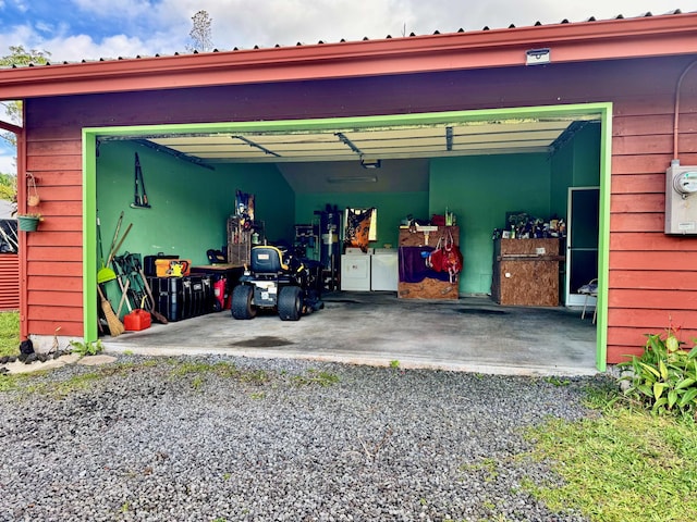 garage featuring independent washer and dryer