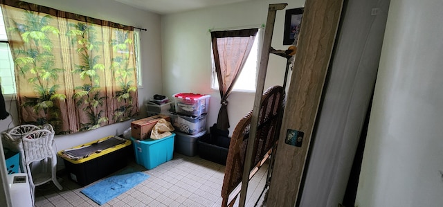 interior space with tile patterned floors
