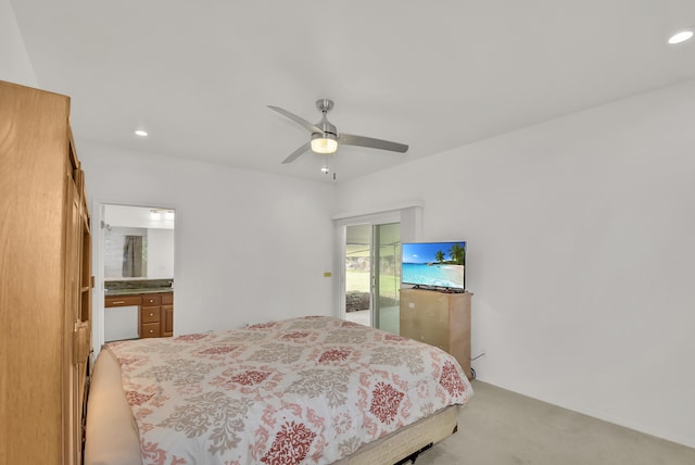 bedroom with carpet flooring, ceiling fan, and ensuite bathroom