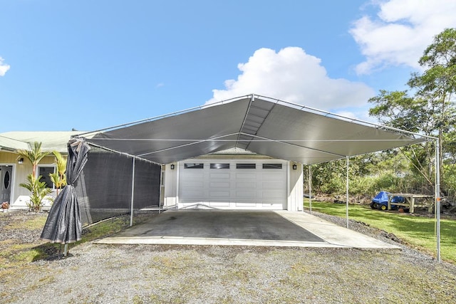 garage with a lawn