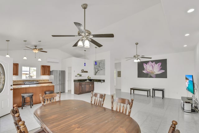 dining area with ceiling fan, lofted ceiling, and an AC wall unit