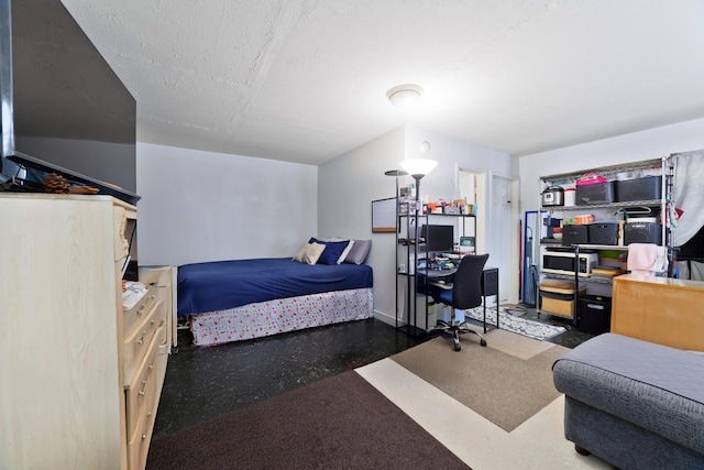 bedroom featuring a textured ceiling