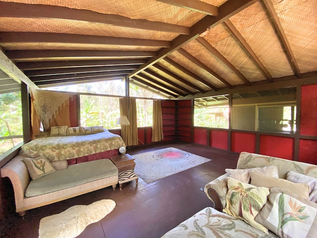 bedroom with multiple windows and vaulted ceiling