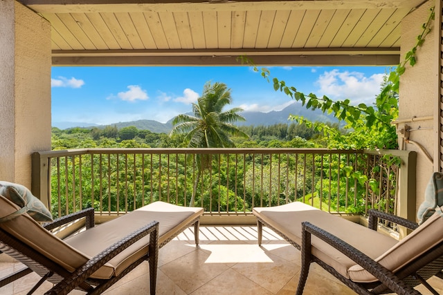 balcony featuring a mountain view