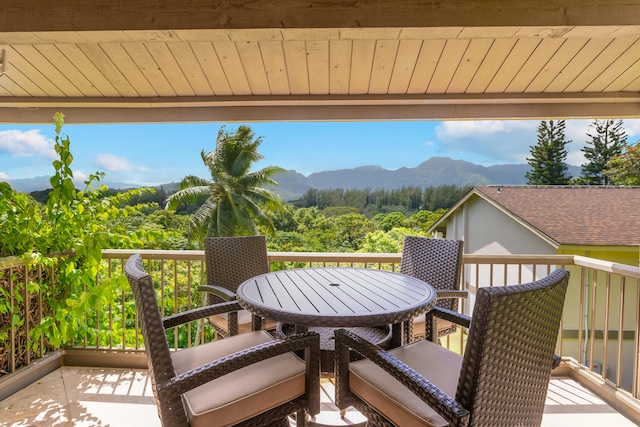 balcony featuring a mountain view