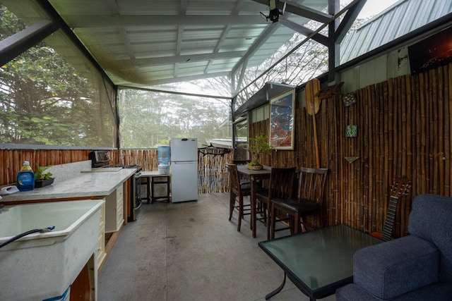 view of patio featuring a bar