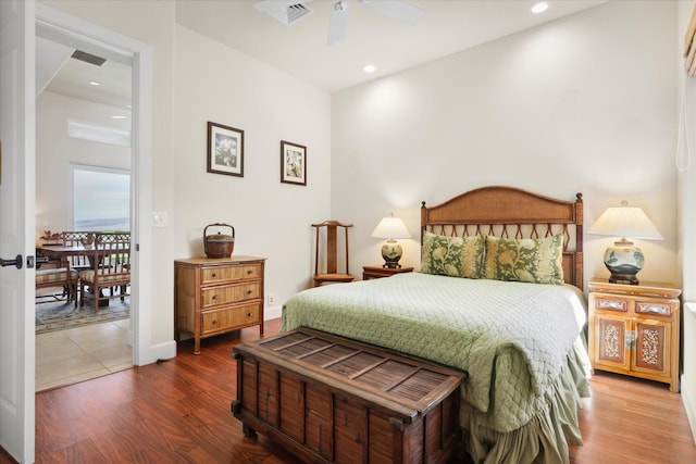 bedroom featuring hardwood / wood-style floors and ceiling fan