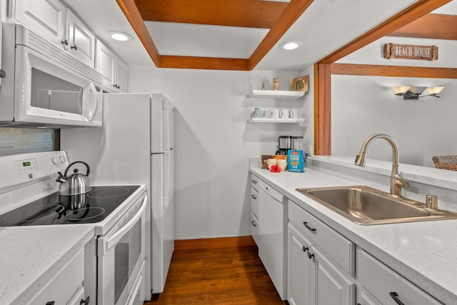 kitchen with sink, white cabinetry, dark hardwood / wood-style flooring, white appliances, and decorative backsplash