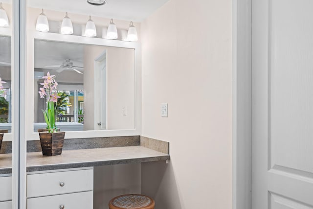 bathroom featuring vanity and ceiling fan