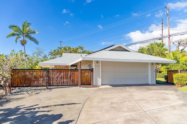 ranch-style home with a garage