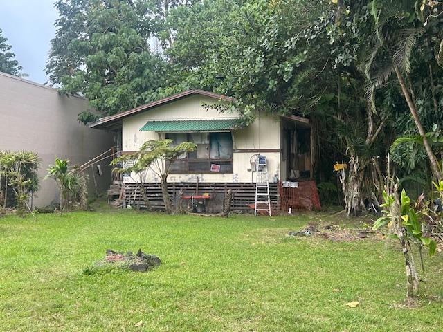 view of front of home with a front yard