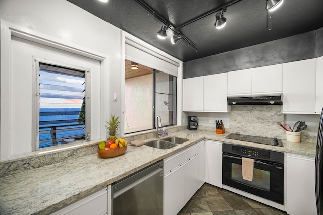 kitchen featuring sink, white cabinetry, light stone counters, black appliances, and backsplash