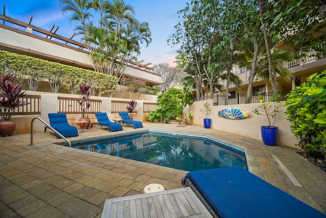 view of pool featuring a patio area